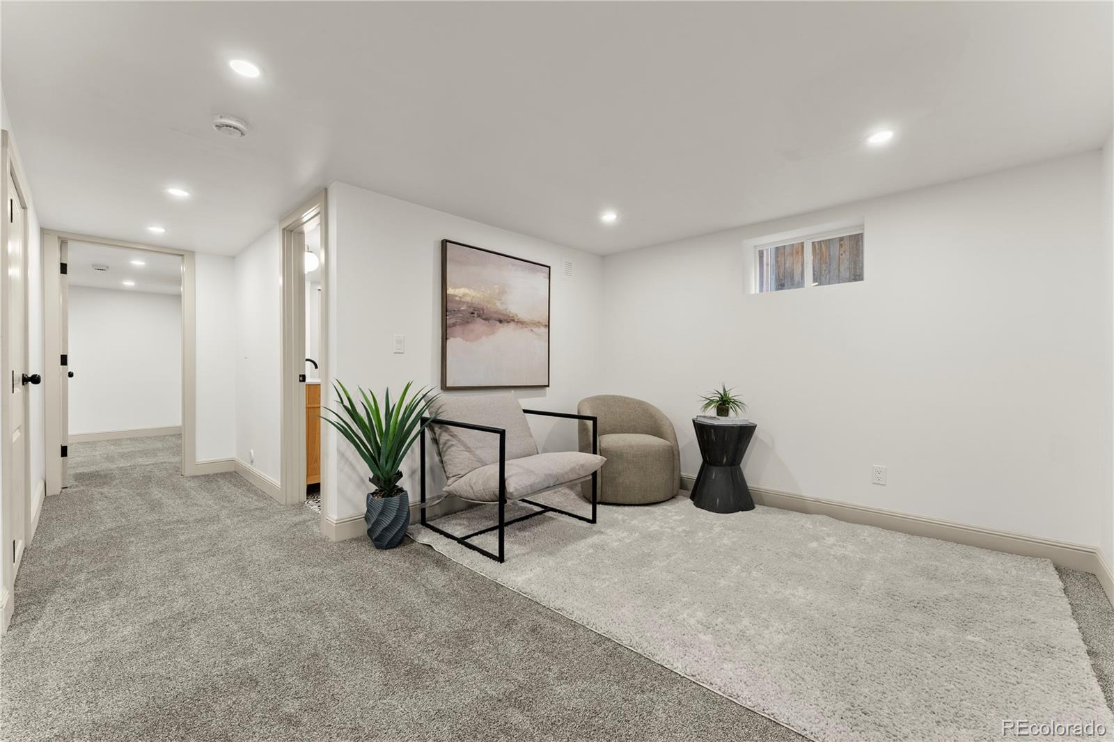 2963 South Lincoln Street Englewood, CO 80113 - Photo 23 of 50 a living room with furniture and a potted plant