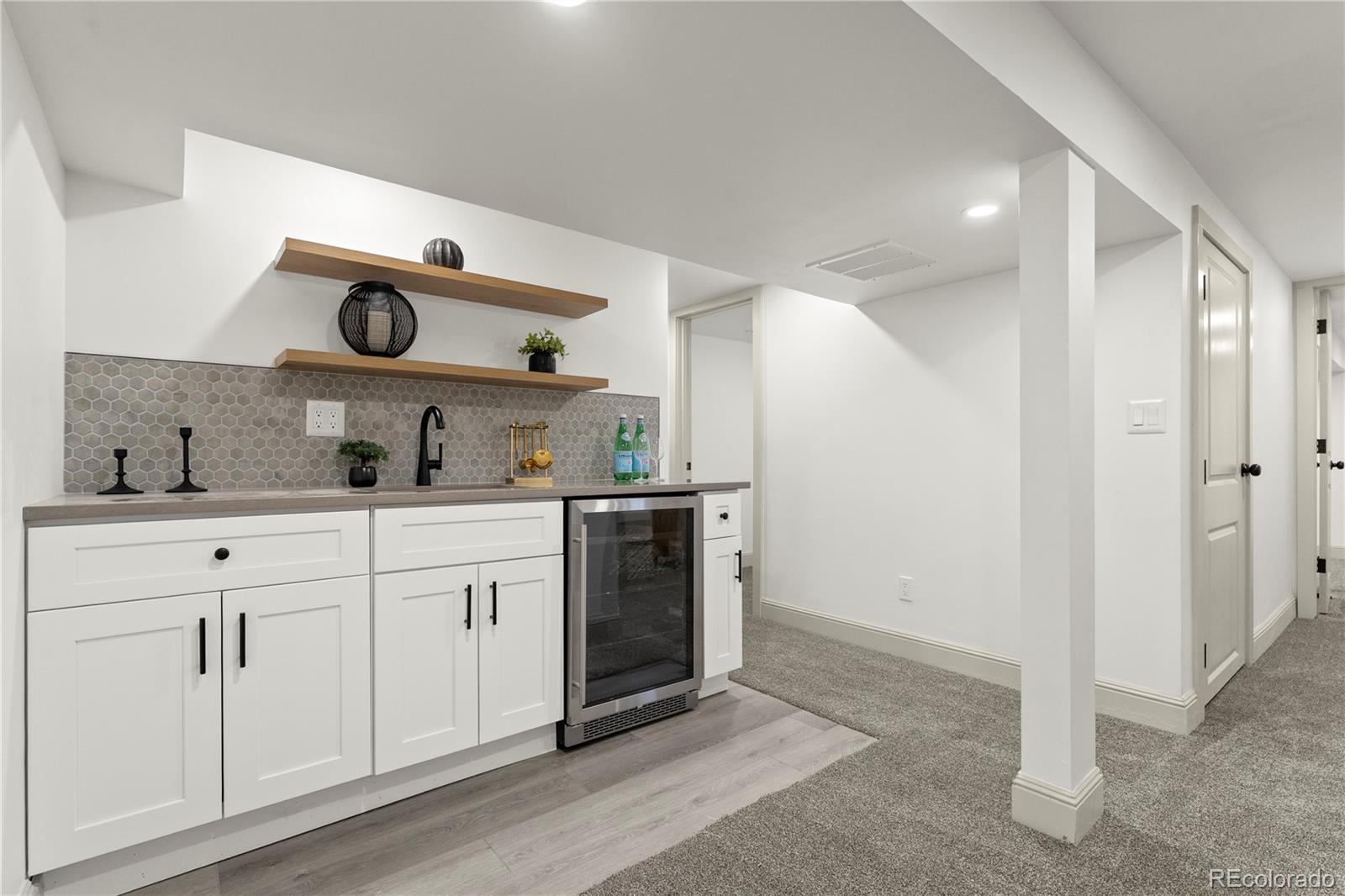 2963 South Lincoln Street Englewood, CO 80113 - Photo 25 of 50 a kitchen with cabinets and window
