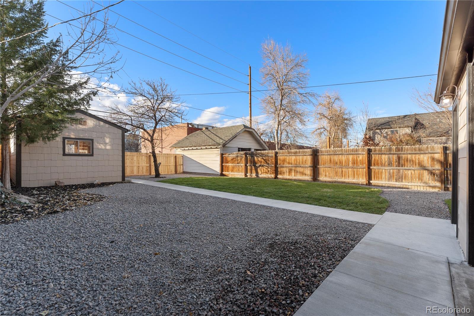 2963 South Lincoln Street Englewood, CO 80113 - Photo 35 of 50 a view of a house with a yard