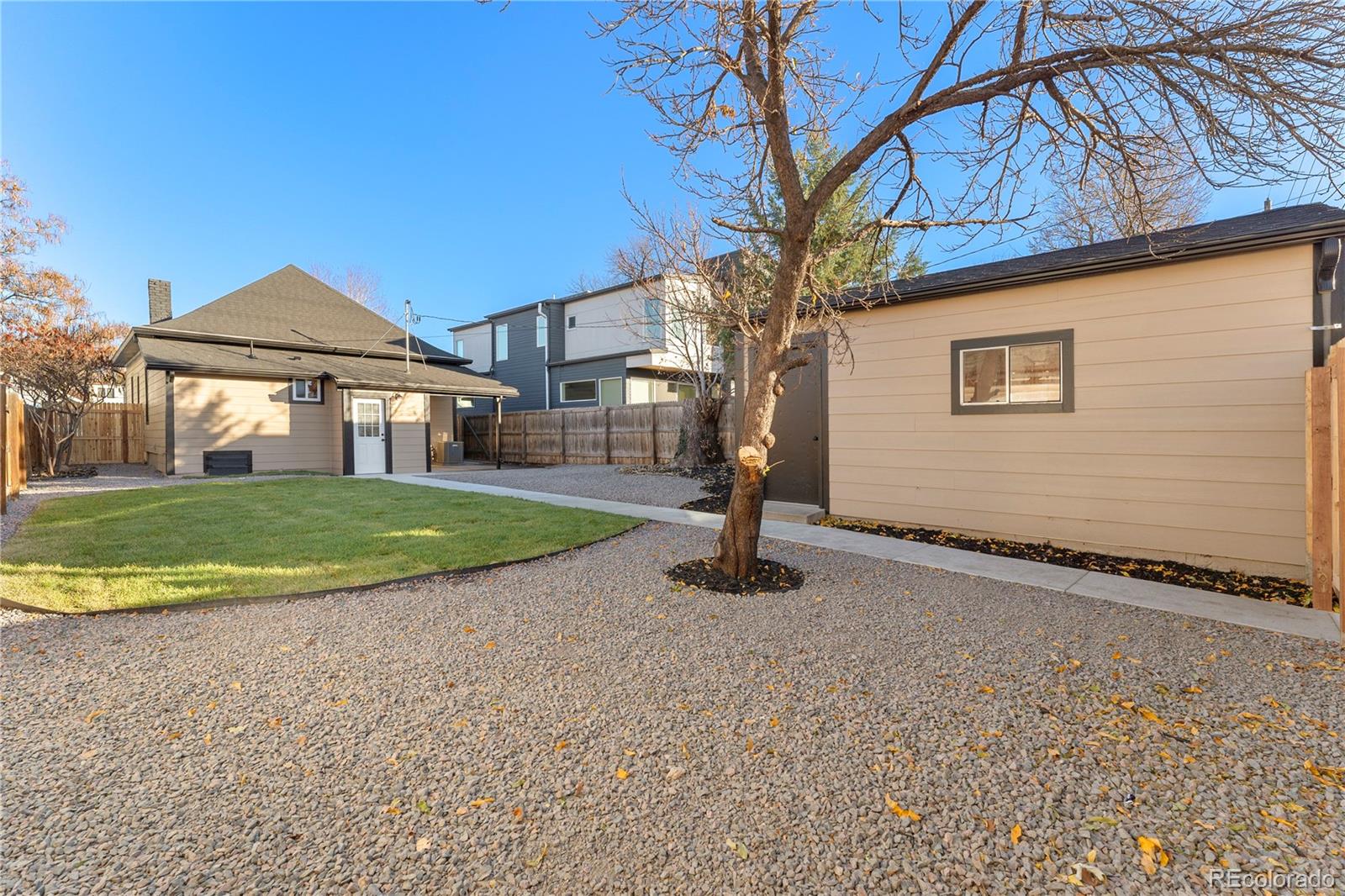 2963 South Lincoln Street Englewood, CO 80113 - Photo 36 of 50 a front view of a house with a yard