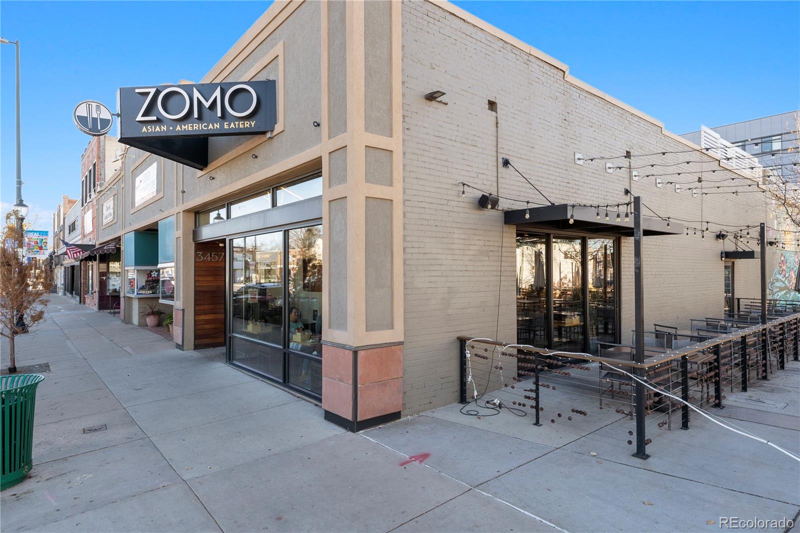 2963 South Lincoln Street Englewood, CO 80113 - Photo 45 of 50 a view of a chairs and table in the patio