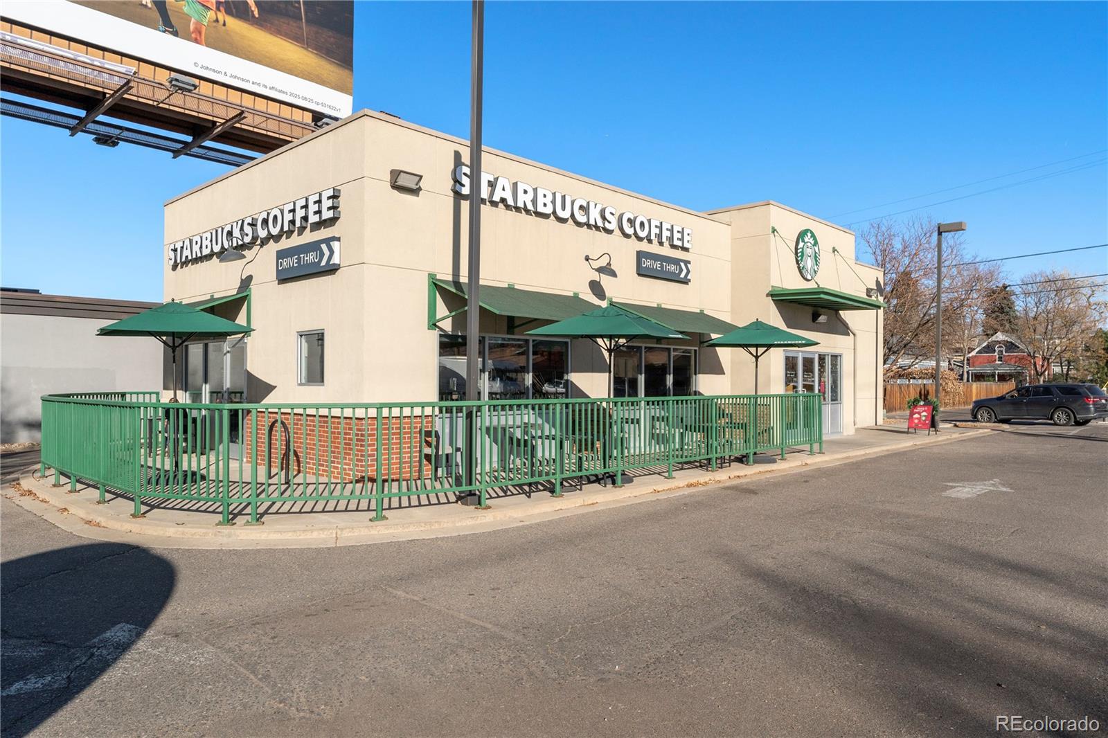 2963 South Lincoln Street Englewood, CO 80113 - Photo 48 of 50 a view of a street with a building in the background
