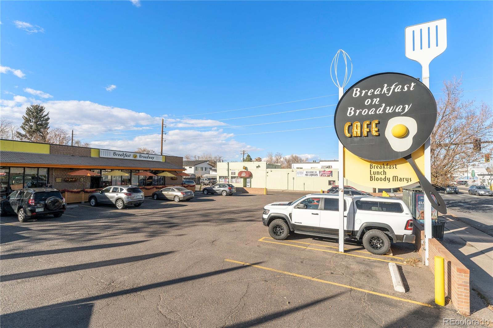 2963 South Lincoln Street Englewood, CO 80113 - Photo 49 of 50 a car parked on the side of a street