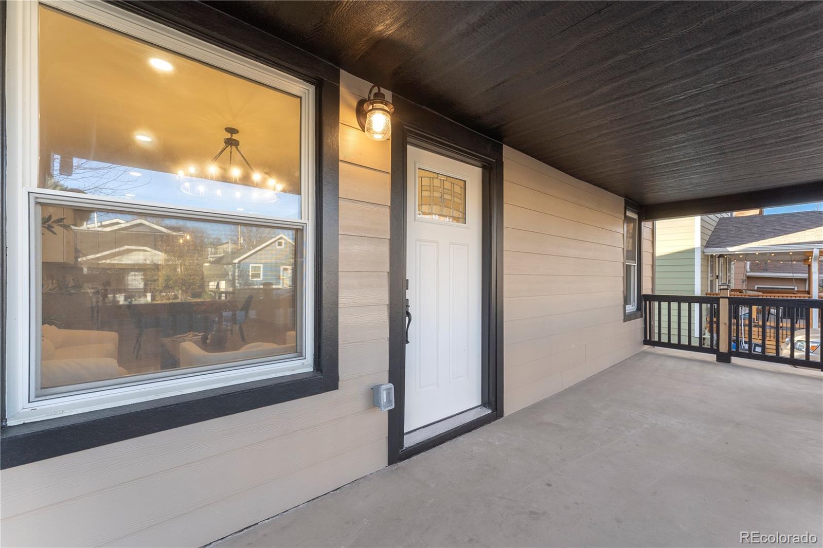 2963 South Lincoln Street Englewood, CO 80113 - Photo 5 of 50 a view of an empty room with a window