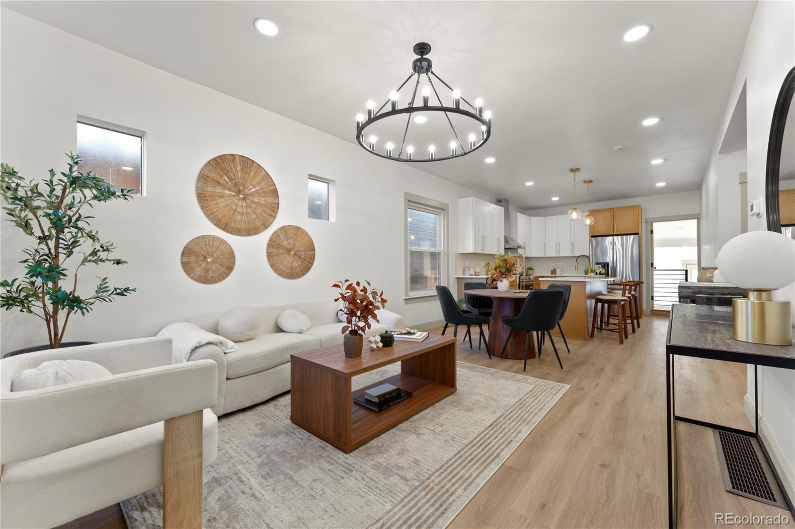 2963 South Lincoln Street Englewood, CO 80113 - Photo 6 of 50 a living room with lots of furniture and white walls