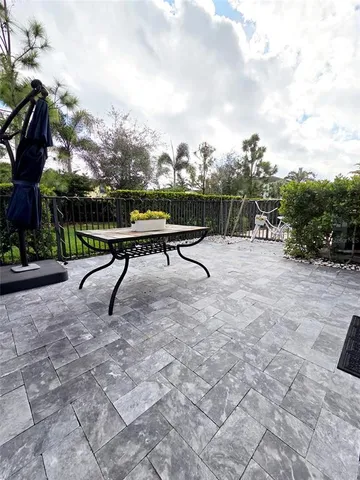 a bench sitting in the middle of a yard