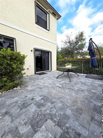 a view of a terrace with a garden
