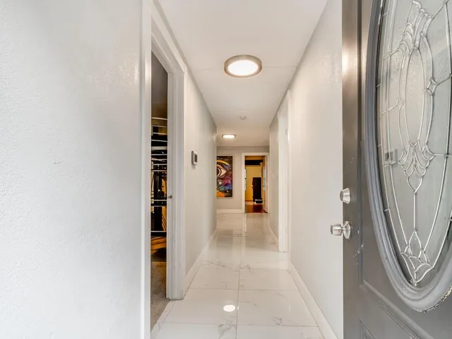 a view of a hallway with a elevator