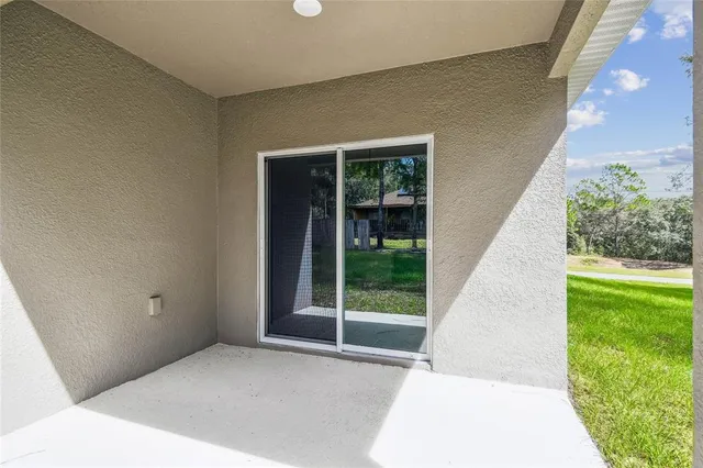 a large kitchen with stainless steel appliances kitchen island a large counter space a sink and appliances