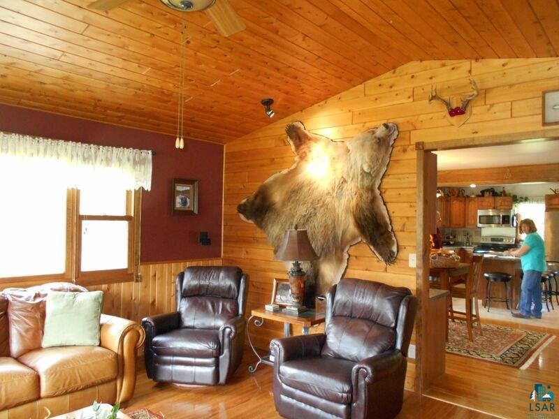 2783 Clark Road Two Harbors, MN 55616 - Photo 11 of 24 Living room open to dining room