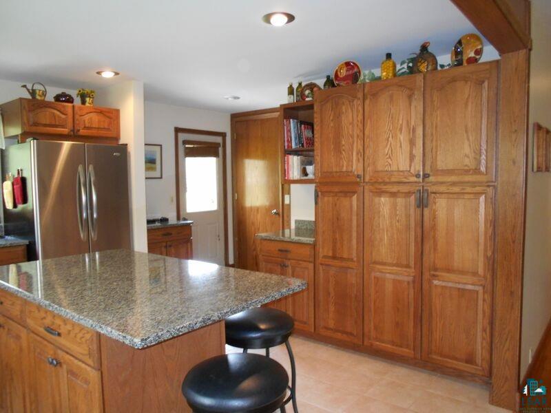 2783 Clark Road Two Harbors, MN 55616 - Photo 9 of 24 Kitchen facing rear entrance