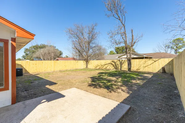 a view of a backyard of a house