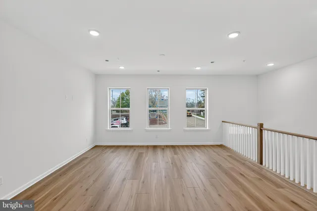 a view of livingroom with hardwood floor and window