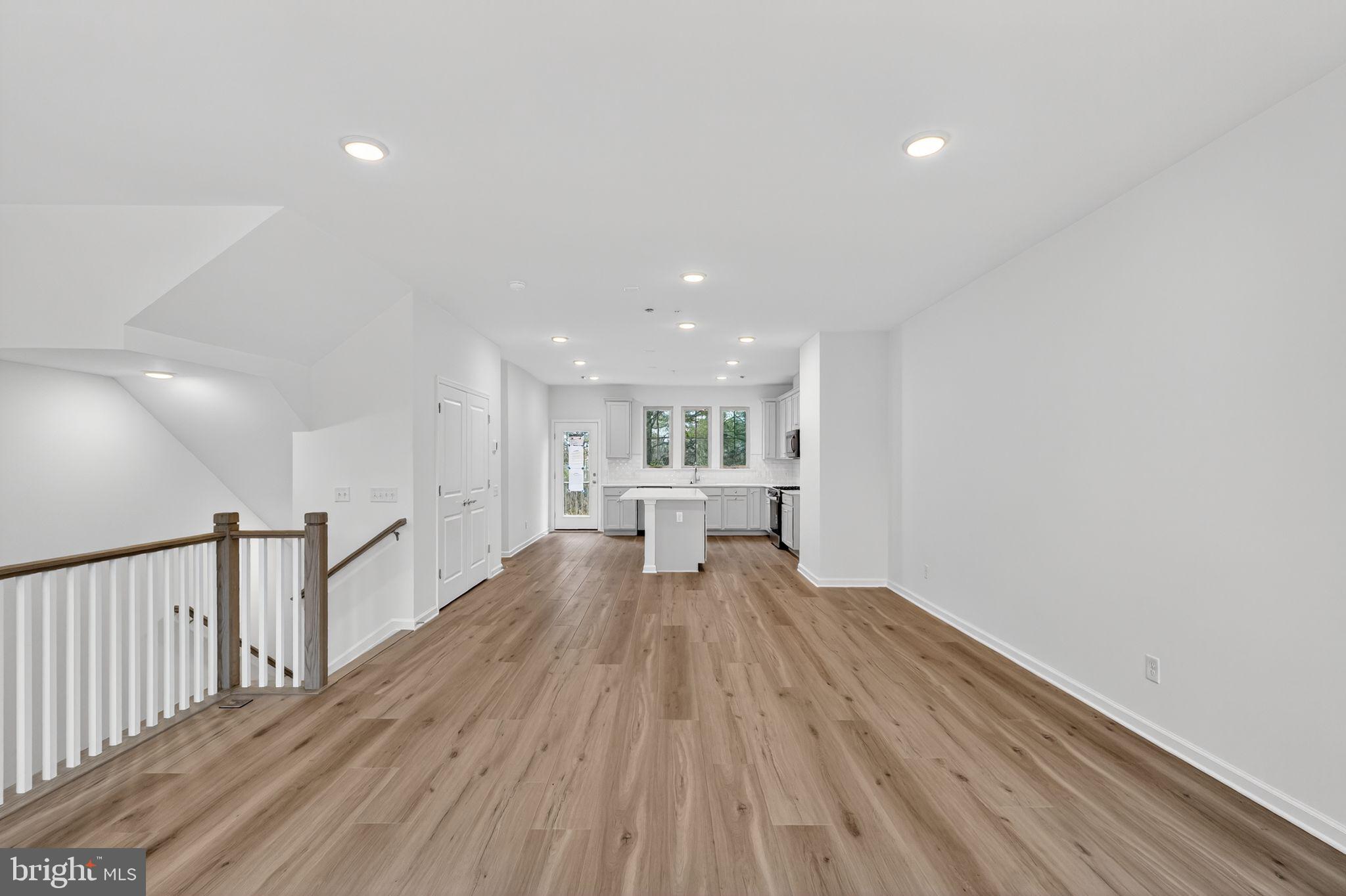 103 Beacon Court, Unit 10102 Lansdale, PA 19446 - Photo 9 of 17 a view of a living room hardwood floor