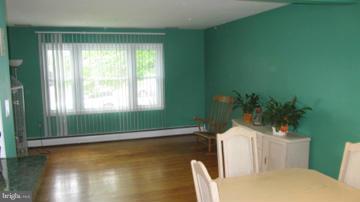 1408 Mt Airy Road Rosedale, MD 21237 - Photo 14 of 22 a kitchen with a sink and a toilet