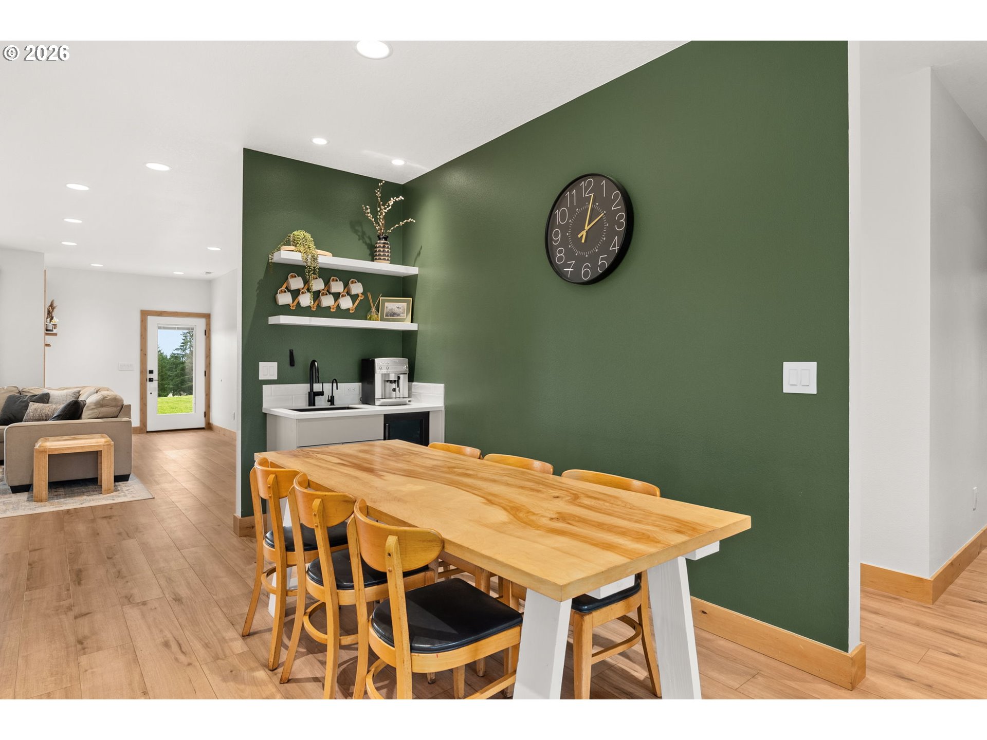 527 Tennessee Road Winlock, WA 98596 - Photo 16 of 48 a view of a dining room with furniture and wooden floor