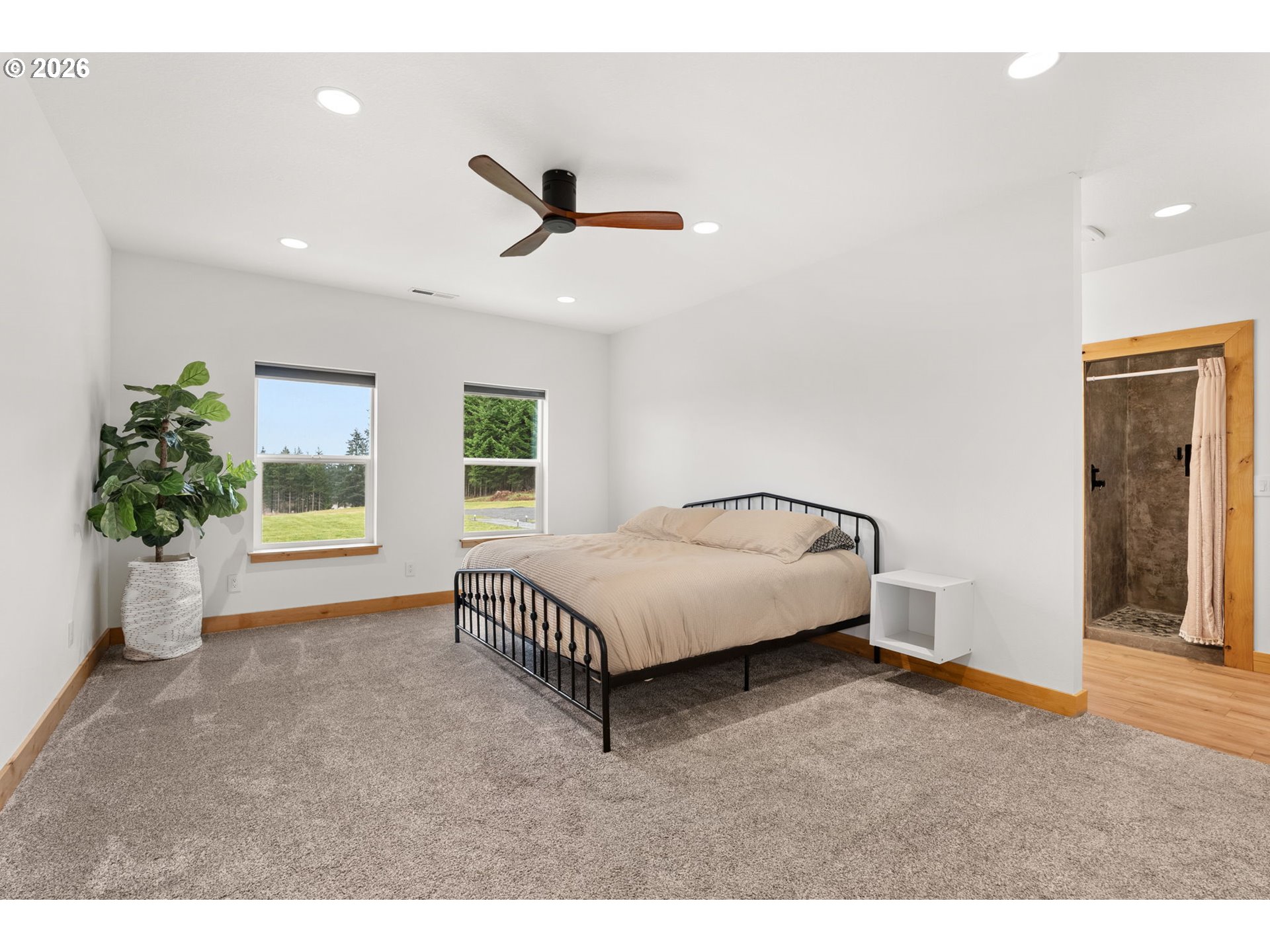 527 Tennessee Road Winlock, WA 98596 - Photo 18 of 48 a spacious bedroom with a bed and a window