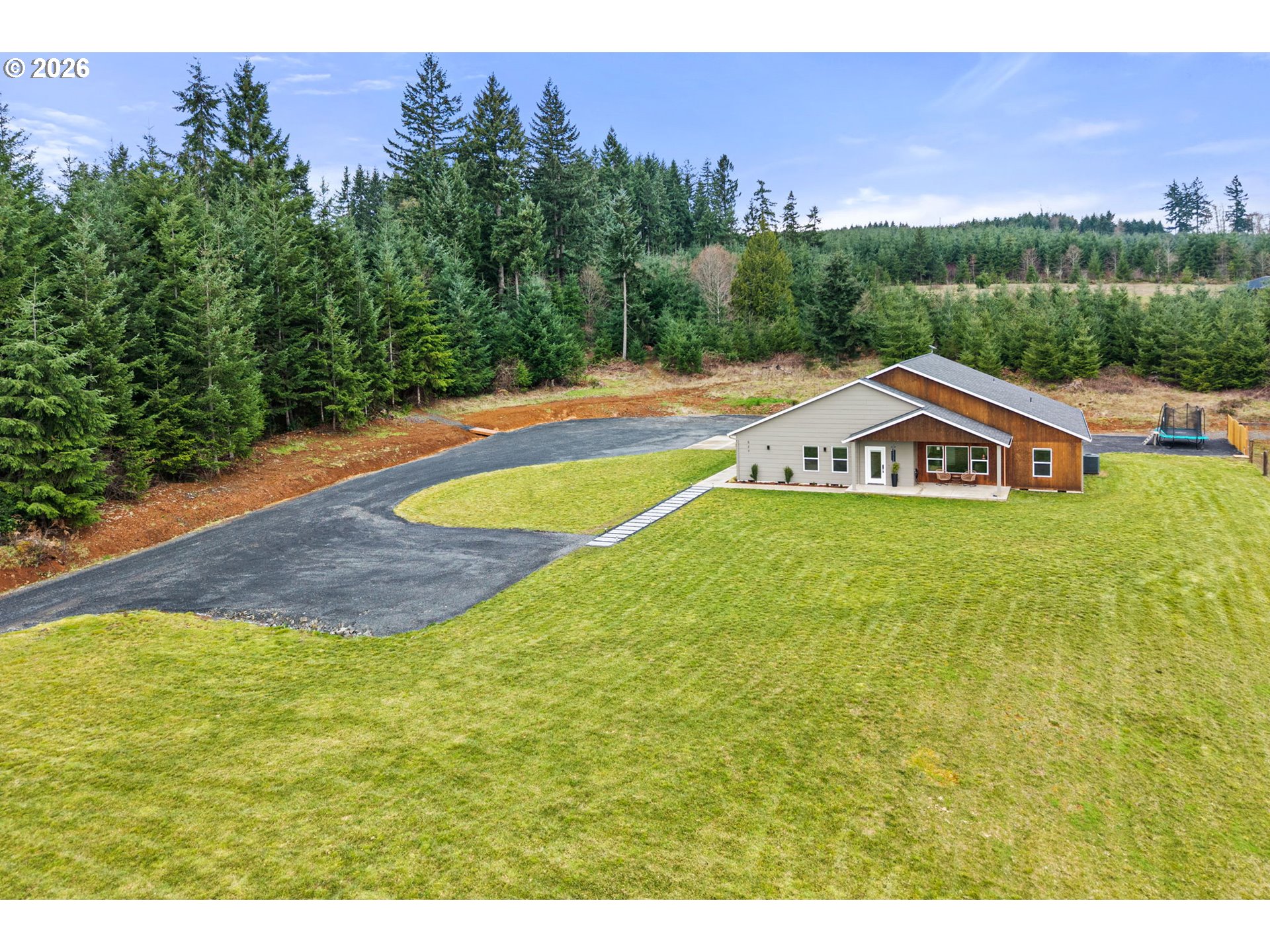 527 Tennessee Road Winlock, WA 98596 - Photo 2 of 48 a view of an outdoor space and a yard