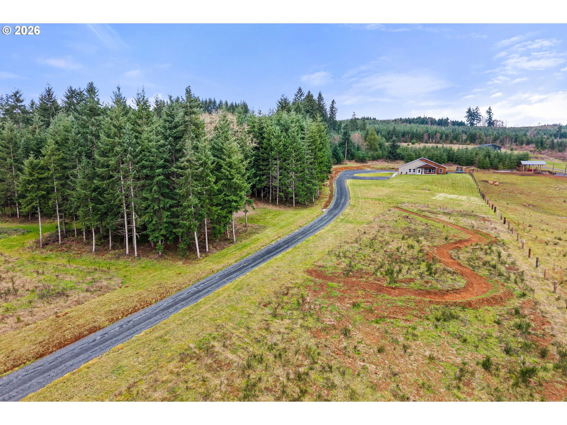 527 Tennessee Road Winlock, WA 98596 - Photo 45 of 48 a view of a yard with a lake