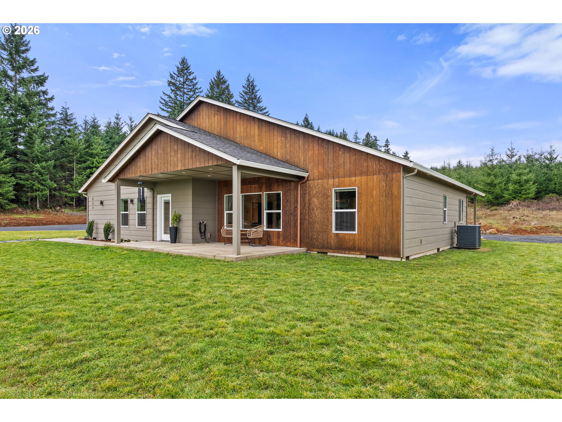 527 Tennessee Road Winlock, WA 98596 - Photo 5 of 48 a view of a house with backyard