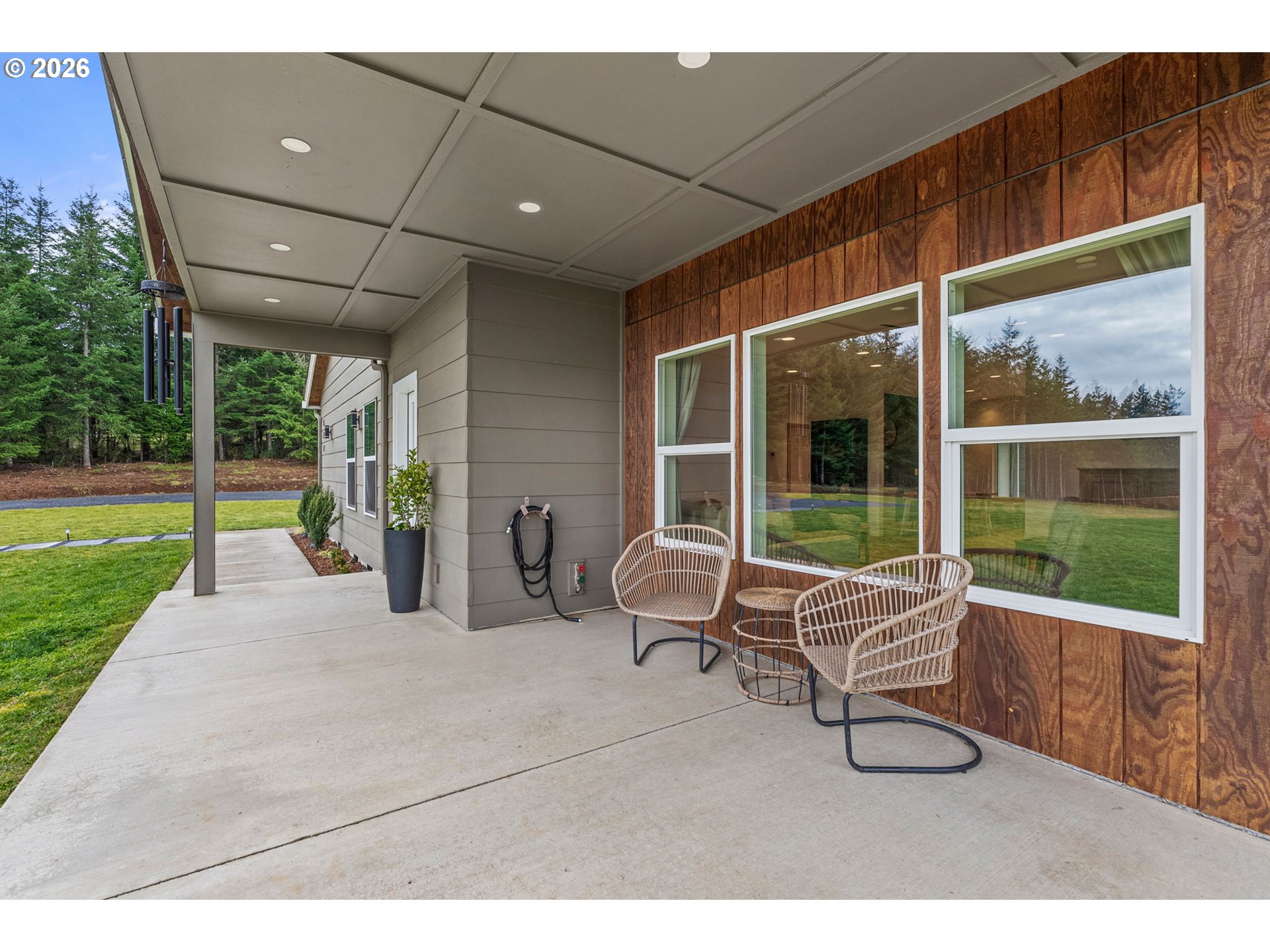 527 Tennessee Road Winlock, WA 98596 - Photo 6 of 48 a building outdoor space with patio furniture and garden