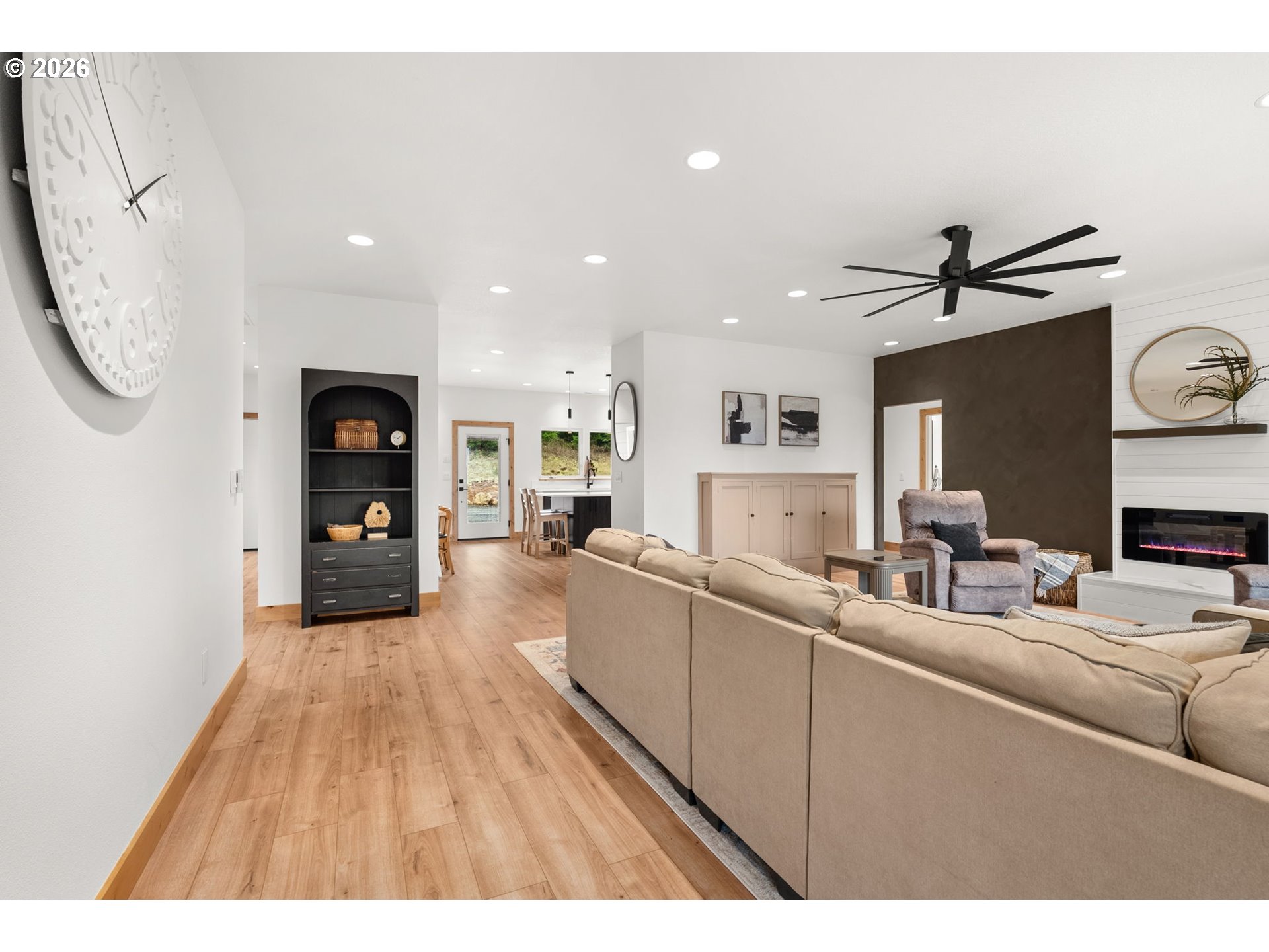 527 Tennessee Road Winlock, WA 98596 - Photo 9 of 48 a living room with stainless steel appliances kitchen island granite countertop furniture a rug and a window