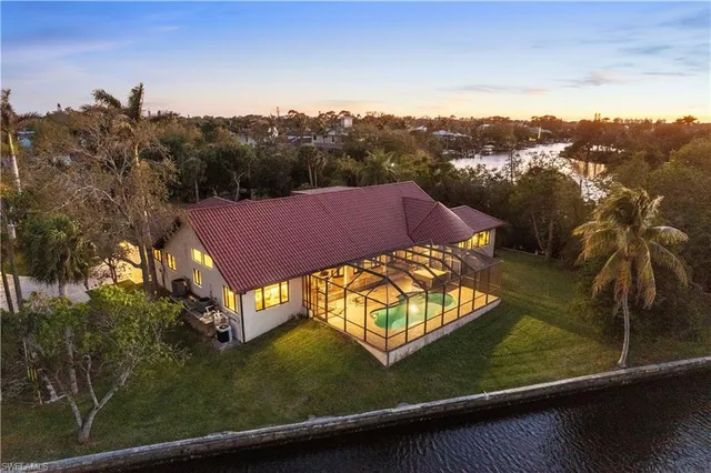 a view of a big yard with a mountain view