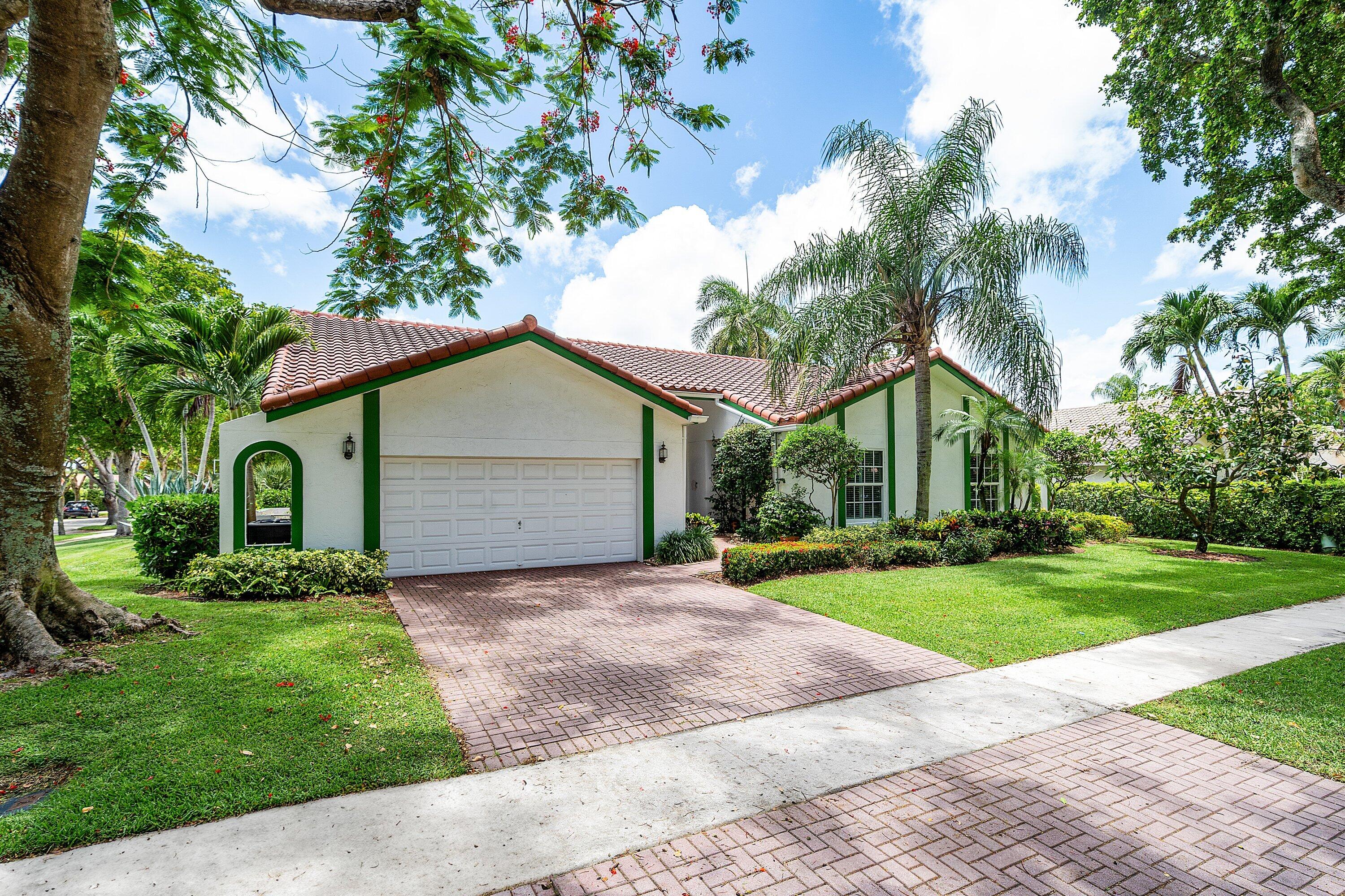 2601 Northwest 27th Terrace Boca Raton, FL 33434 - Photo 3 of 29 002-2601Northwest27thTerrace-BocaRaton-F
