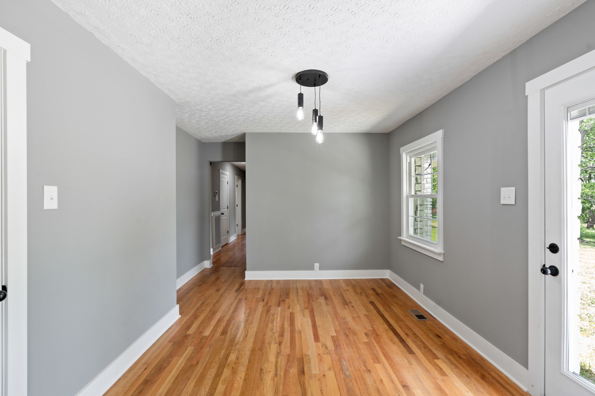 1503 5th Avenue West Springfield, TN 37172 - Photo 16 of 43 a view of empty room with wooden floor and fan