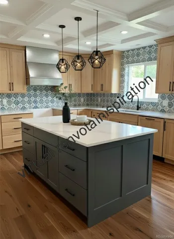 a kitchen with a sink a counter space appliances and cabinets
