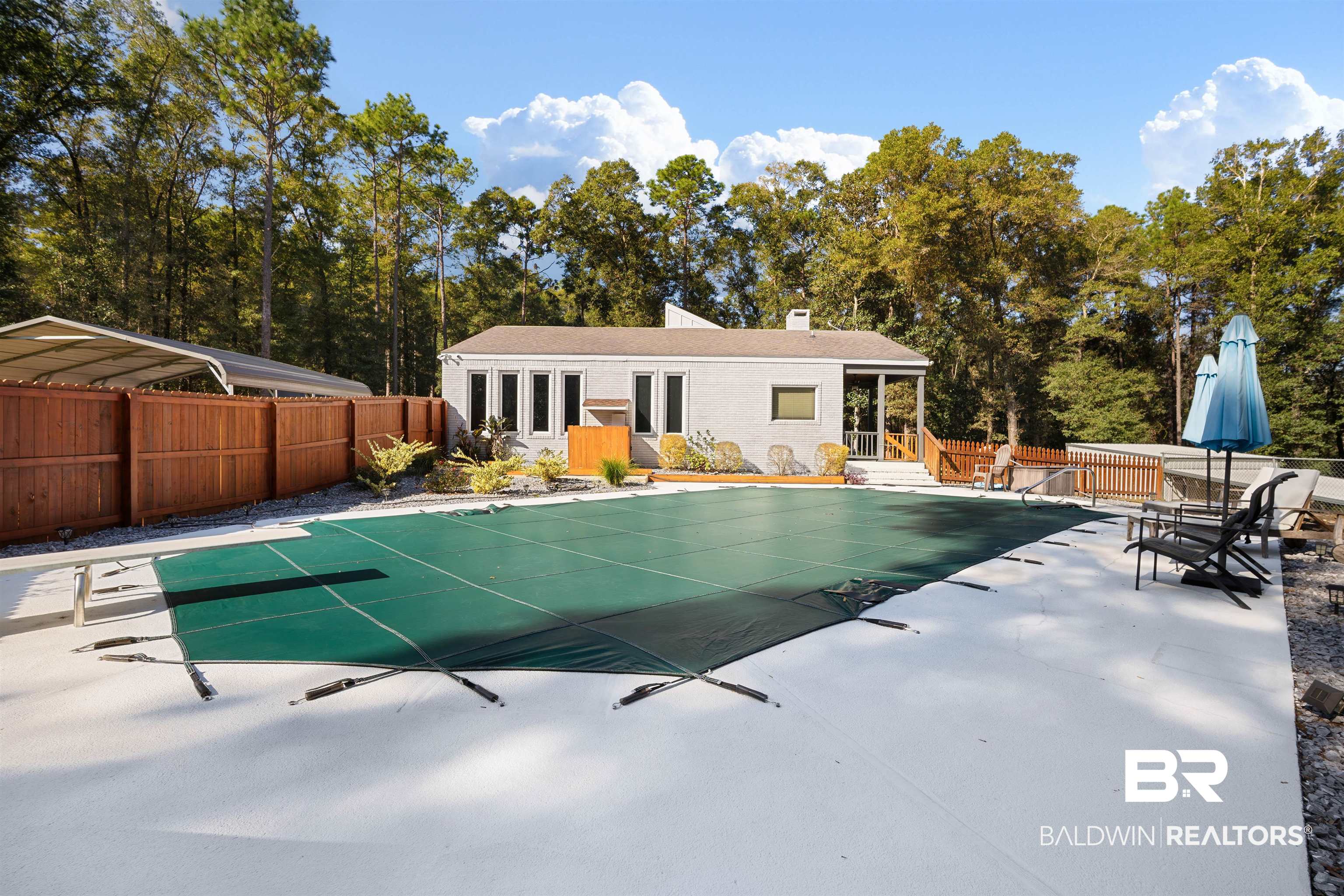 7912 Yorkhaven Road Mobile, AL 36695 - Photo 32 of 41 View of pool with a patio and a diving board