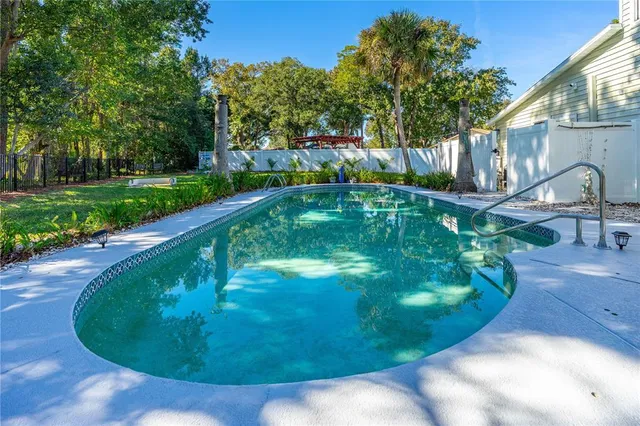 a view of outdoor space with seating and green space