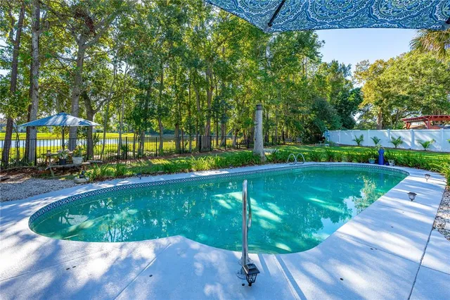 a view of a house with a potted plant and a window