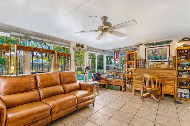 a living room with furniture and window