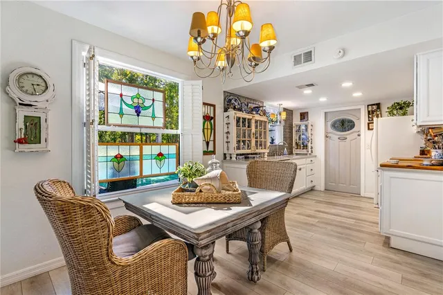 a kitchen with stainless steel appliances granite countertop a stove and a sink