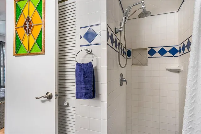 a view of a dining room with furniture a rug and wooden floor