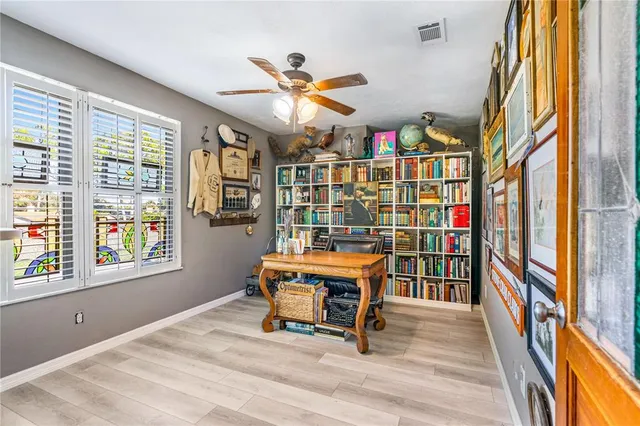 a living room with furniture and window
