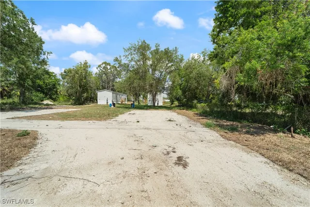 a view of empty space and basketball court
