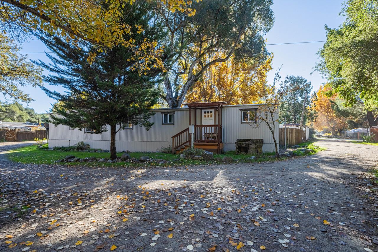 18842 Cachagua Road Carmel Valley, CA 93924 - Photo 12 of 35 a view of a house with a yard