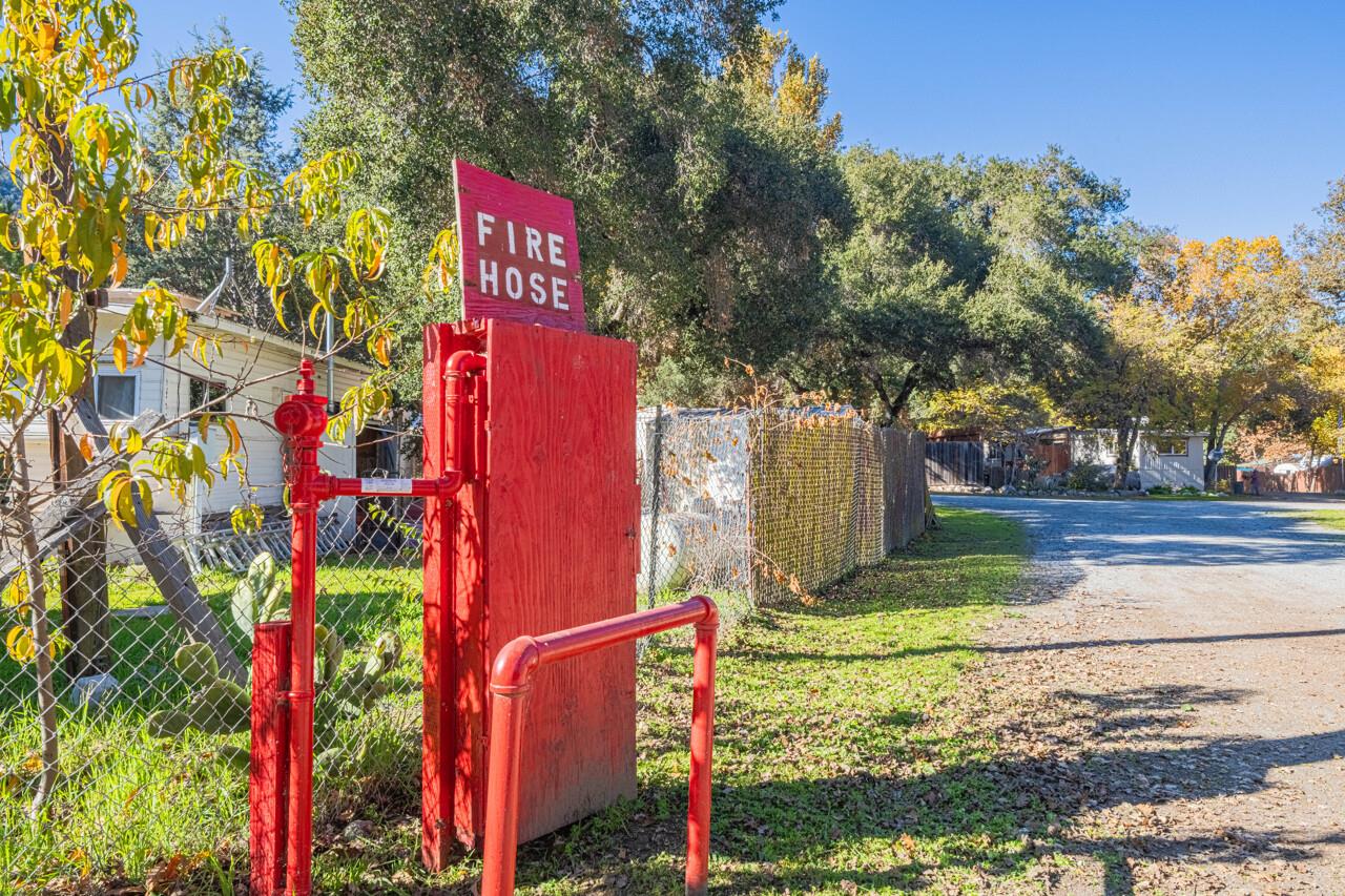 18842 Cachagua Road Carmel Valley, CA 93924 - Photo 23 of 35 a sign that is on the side of a road
