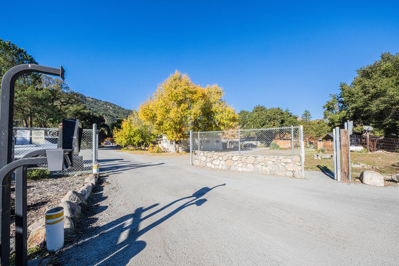 18842 Cachagua Road Carmel Valley, CA 93924 - Photo 5 of 35 a view of a house with backyard and trees
