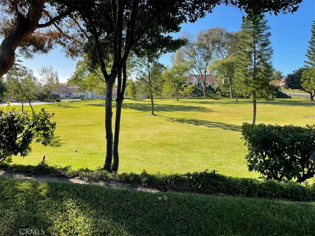 a view of an ocean with a building in the background