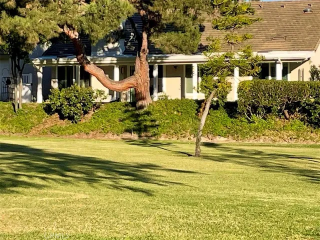 a view of a house with a swimming pool