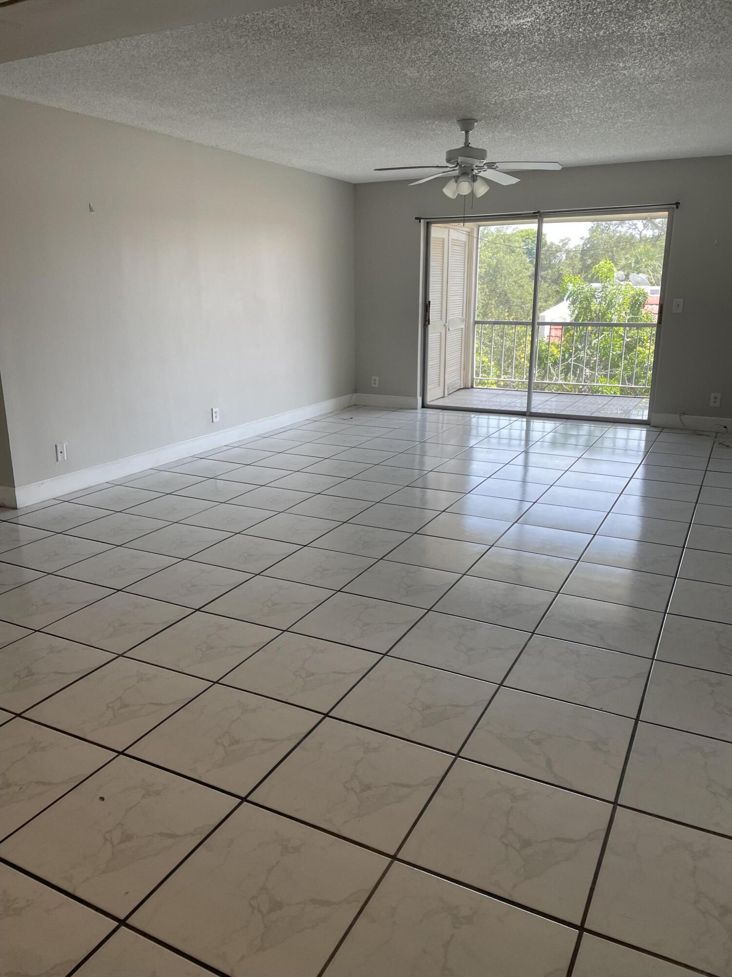 642 Northwest 13th Street, Unit 31 Boca Raton, FL 33486 - Photo 3 of 10 IMG_1063