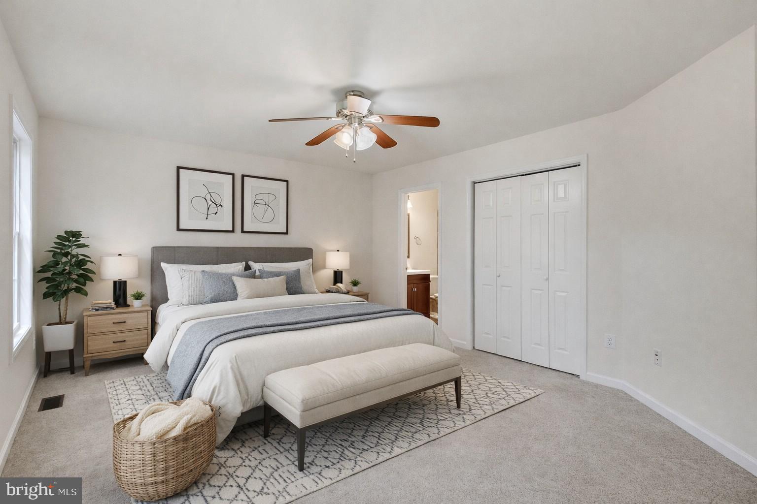 7168 Botha Road Bealeton, VA 22712 - Photo 23 of 36 a bedroom with bed and a chandelier