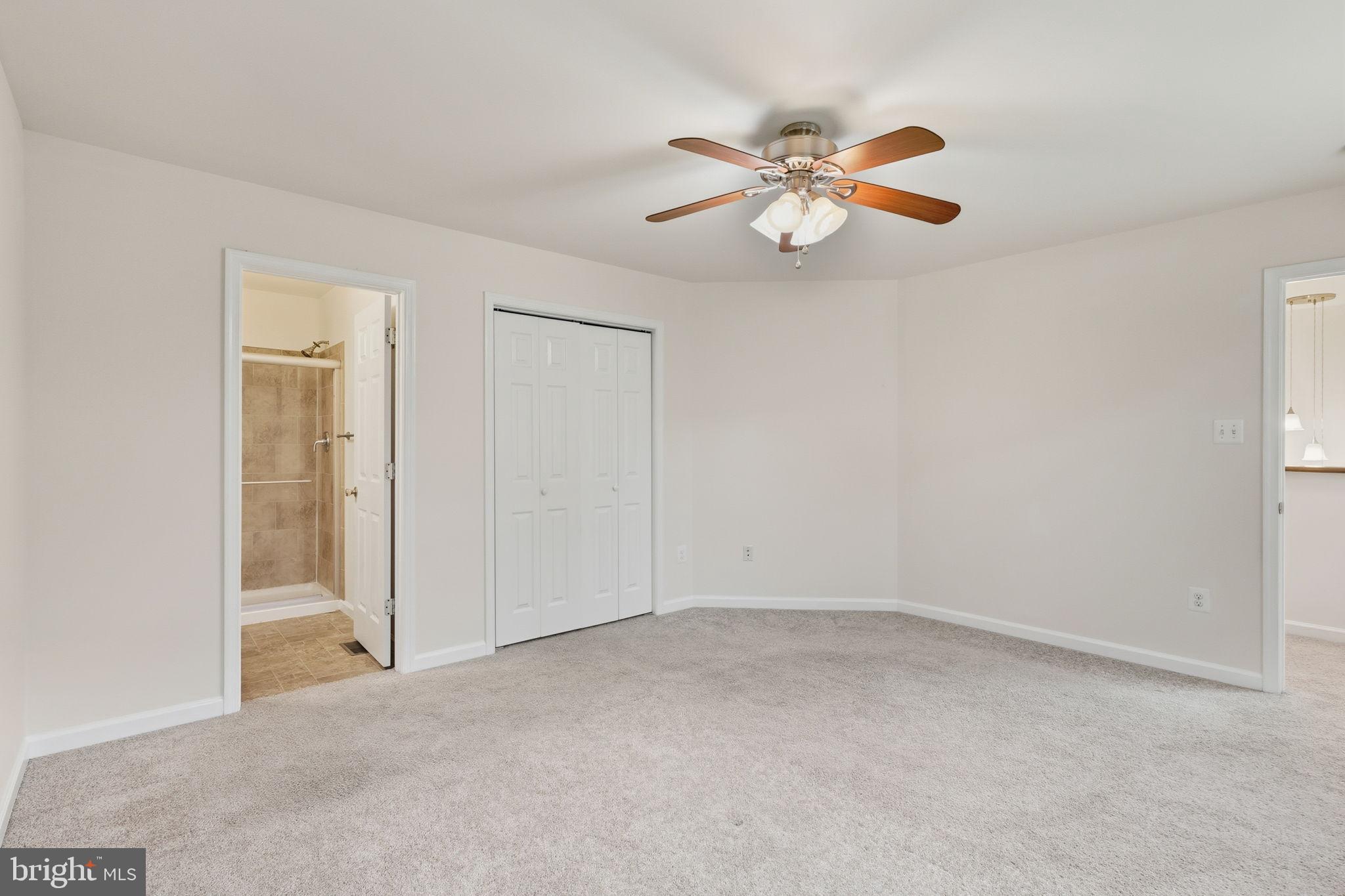 7168 Botha Road Bealeton, VA 22712 - Photo 24 of 36 an empty room with windows and fan