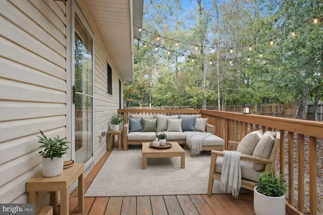 a view of a patio with furniture
