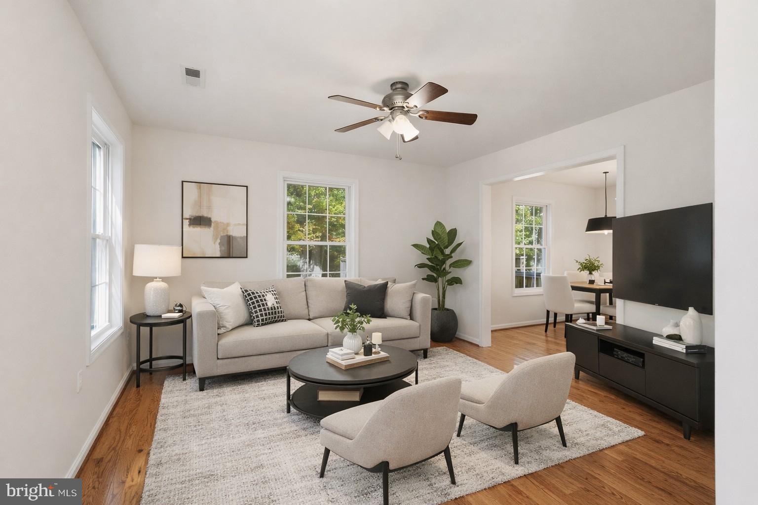 7168 Botha Road Bealeton, VA 22712 - Photo 9 of 36 a living room with furniture and a flat screen tv
