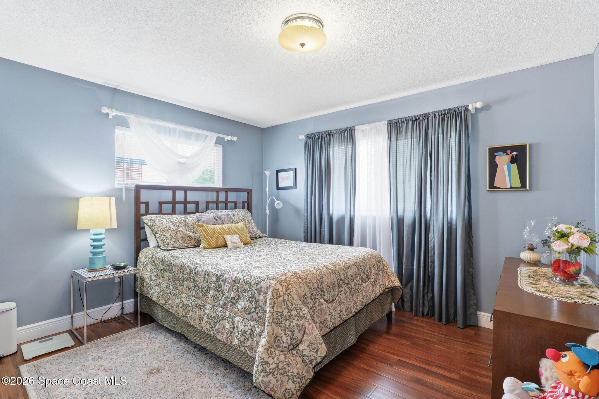 908 Jefferson Road Rockledge, FL 32955 - Photo 16 of 37 a bedroom with a bed and a window