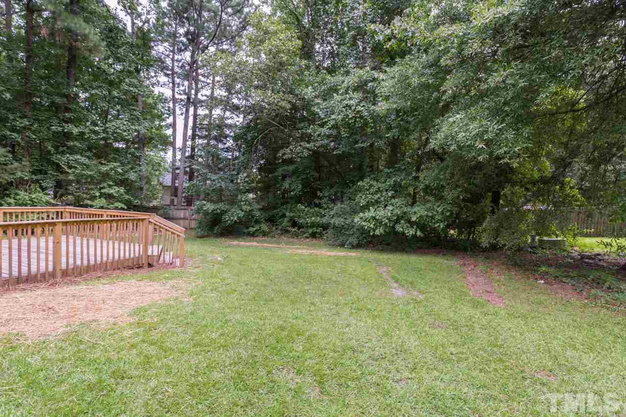 3424 Freeman Road Durham, NC 27703 - Photo 22 of 23 a view of a yard with large trees